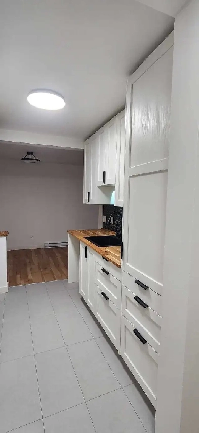 Condo 4½ Fraîchement Rénové – Clé en Main! Image# 2