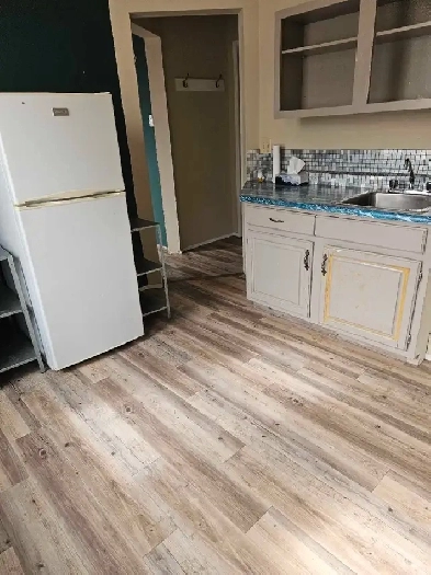 One Bedroom Apartment Above a retail store Image# 4