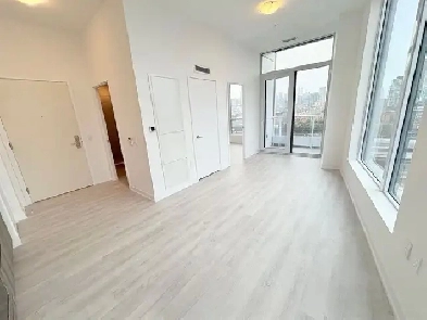 Waterfront Living! Stylish 1-Bd Corner Unit w/ Balcony & Laundry Image# 1