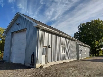Shop for rent, large overhead door 38 ft long 25 ft wide. Image# 6