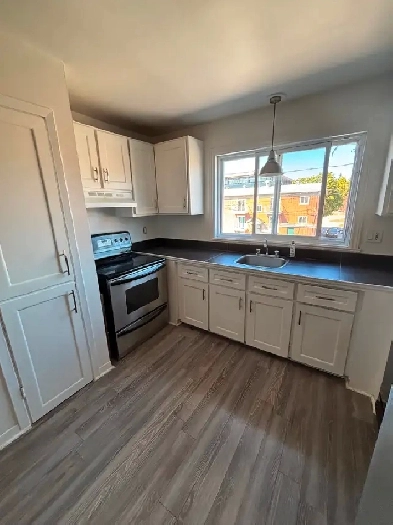 Beau grand 4 et demi chauffe eau chaude secteur Charlesbourg Image# 1