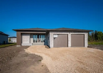 Beautiful 1740sqft Custom-Built Bungalow by Warkentin Homes! Image# 1