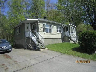 3 Maisons a vendre dans un Quartier tranquille a Fabreville Lava Image# 4
