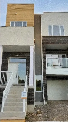 Spacious 3 bedroom end unit townhouse for rent in Huron area Image# 1