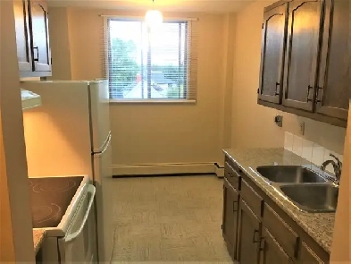 FANTASTIC move in ready 1 bed apartment in Kensington near SAIT Image# 1