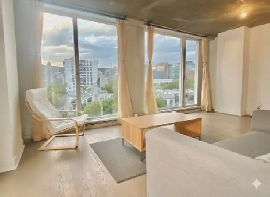 4.5 2 sdb, condo tres LUMINEUX sur Renevesque Image# 1