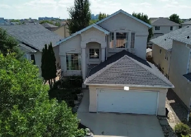 3-Storey Richmond West Home with $2550/Mo Basement Rental Income Image# 1