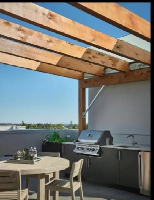 Penthouse unit with private 750 sqf patio with outdoor kitchen Image# 1