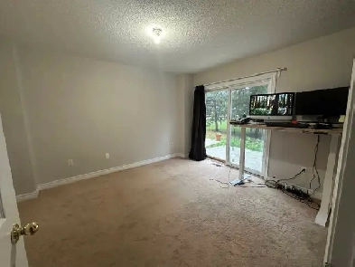 Room for rent - 1 bedroom   den in shared home Image# 1