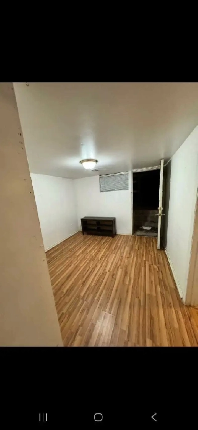 1 bedroom basement apartment all utilities included Image# 1