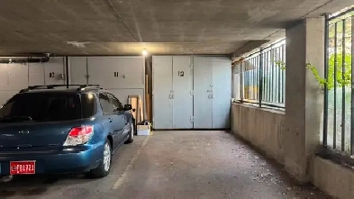 Secure Underground Parking with Matching Private Storage Locker Image# 1