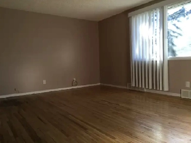 Main floor with 3 spacious bed rooms at Forest Lawn community Image# 5