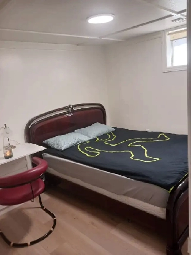 The brand new private day room with a queen-size bed Image# 1