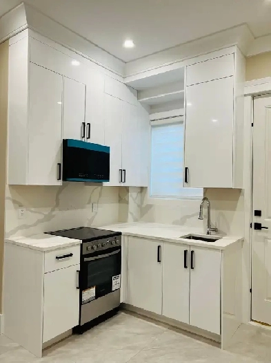 2 bedroom ground floor including laundry in new house side suite Image# 1