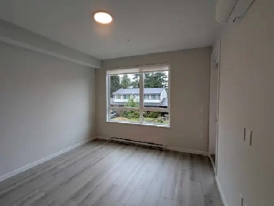 brand new 1 1 den in Coquitlam Image# 1
