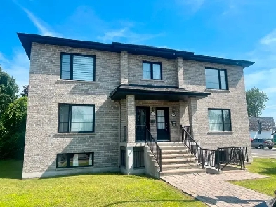 Condo 4 1/2 avec garage Image# 1