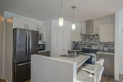 Très beau et grand 4 1/2 style maison Image# 1