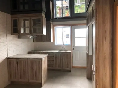 Grand 6 1/2 style condo (accès mobilité réduite) Image# 1