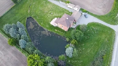 A Beautiful House with A Pond Residing on a 2-Acre Lot For Sale Image# 5