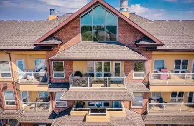 penthouse with fireplace, UG parking, wifi included! Image# 1