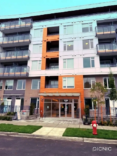 Brand New 1 Bed   Den Condo in Surrey - Steps from Central City Image# 1