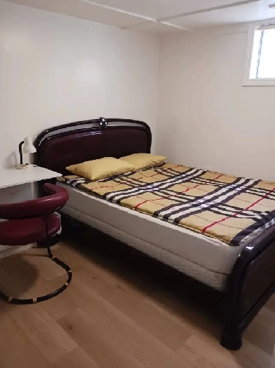 A brand new private day room with a queen-size bed Image# 1