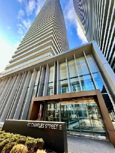 Two bedrooms unit in modern condo at Heart of downtown Image# 1