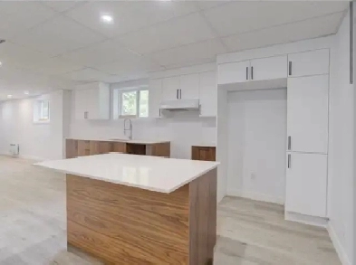 1 400 $ – 4 ½ au sous-sol avec stationnement et cour Image# 4