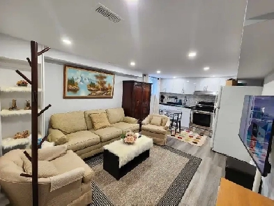 LUXURY BASEMENT APARTMENT – FULLY FURNISHED & ALL-INCLUSIVE Image# 1