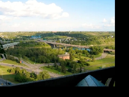 Downtown top floor condo with breathtaking river valley view Image# 1