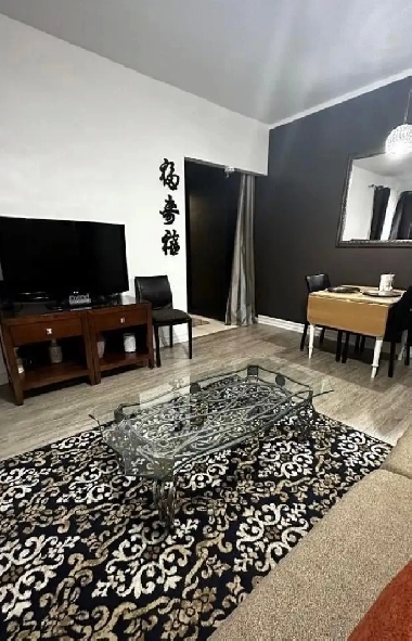 Bright & Spacious 1-Bedroom Suite | All Utilities Included! Image# 1