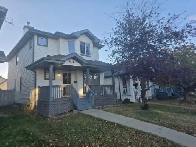 4 BEDROOMS SINGLE FAMILY HOME W/A DOUBLE DETACHED GARAGE IN WEST Image# 2