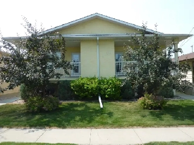 Two Bedrooms Plus Den in a Fourplex Image# 1