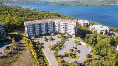 24-120 Spacious corner condo with spectacular water views Image# 1