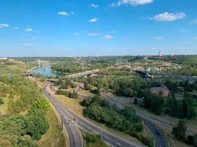 Downtown top floor apartment with breathtaking river valley view Image# 1