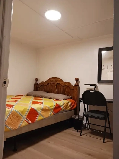 The brand new private day room with a queen-size bed Image# 1