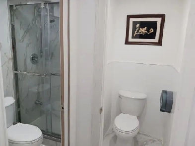 A brand new private day room with a queen-size bed Image# 1