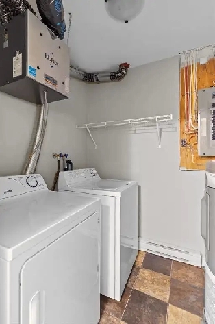 Spacious & Modern 2 Beds, 1 Bath Basement Apartment in Paradise Image# 2