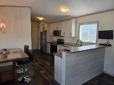 A GREAT CONDO ALTERNATIVE! Image# 1