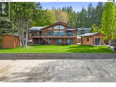 WATERFRONT HOME WITH 4 car garage Image# 4