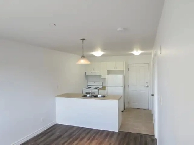 Cozy One-Bedroom Unit in a Secure, Family-Oriented Building Image# 1