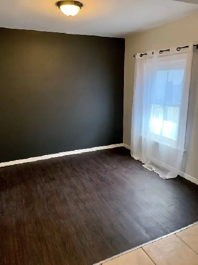 Clean & Comfortable 1BR Main Floor – All-Inclusive Near Downtown Image# 1