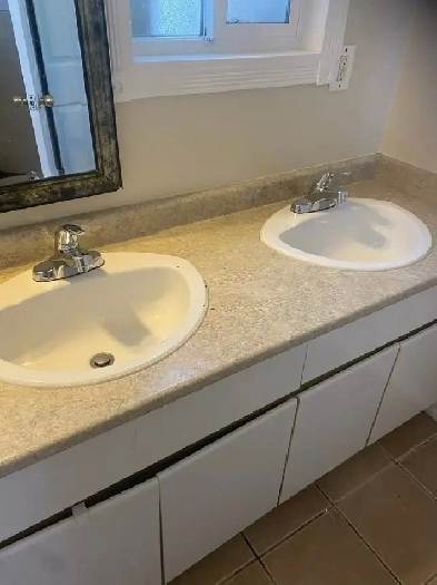 WE LOOKING FOR A ROOMATE IN A PRIVATE BASEMENTE SUITE Image# 1