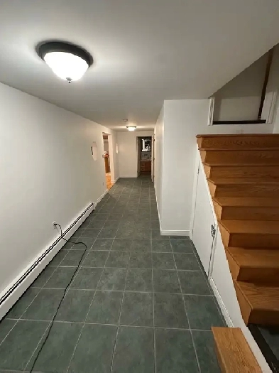 1 Bedroom   Den Basement Suite with Kitchenette Image# 3