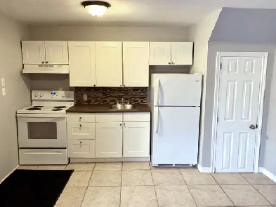 Clean & Comfortable 1BR Main Floor – All-Inclusive Near Downtown Image# 1