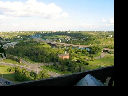 Downtown top floor suite with breathtaking river valley view Image# 1