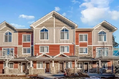 Beautiful 2-Bed, 3-Bath Townhome with Office • Heated Garage Image# 1