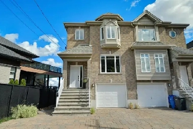 Maison en rang  louer aux abords de la rivire des Prairies