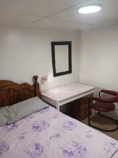 A brand new private day room with a queen-size bed Image# 5