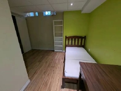 Furnished private basement suite with mini-kitchen and bathroom Image# 1